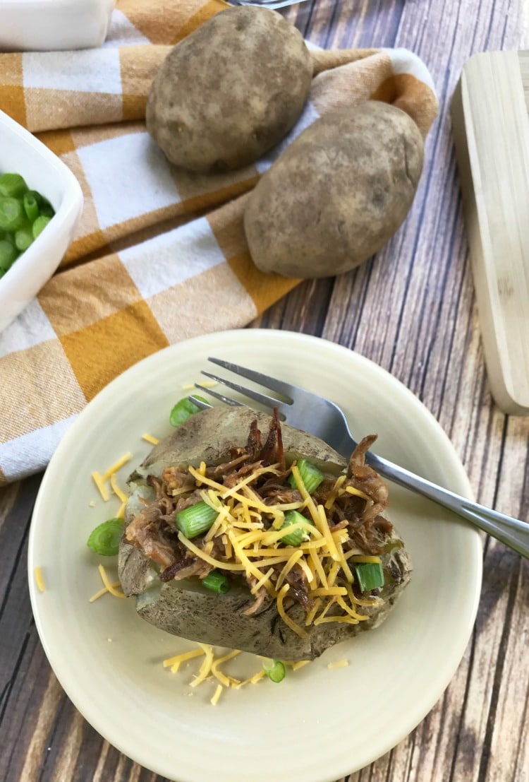 Baked Potato with Pulled Pork - Recipe instructions included for both the Crock Pot and Instant Pot!
